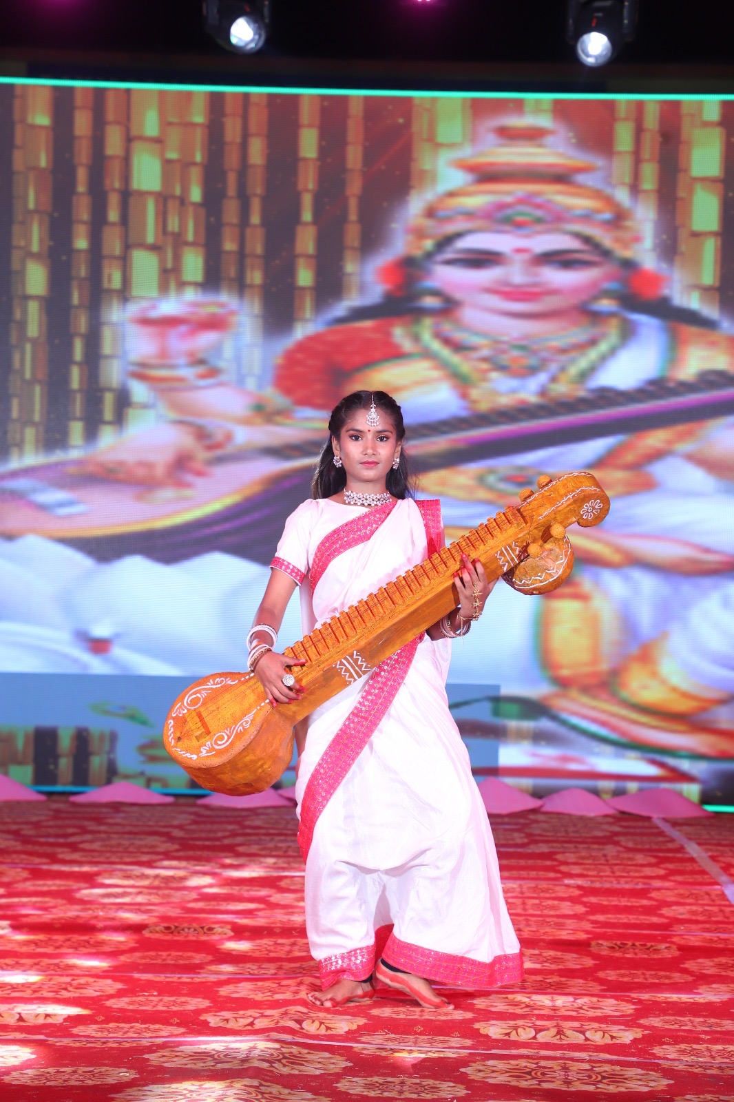 Student performing Saraswati presentation